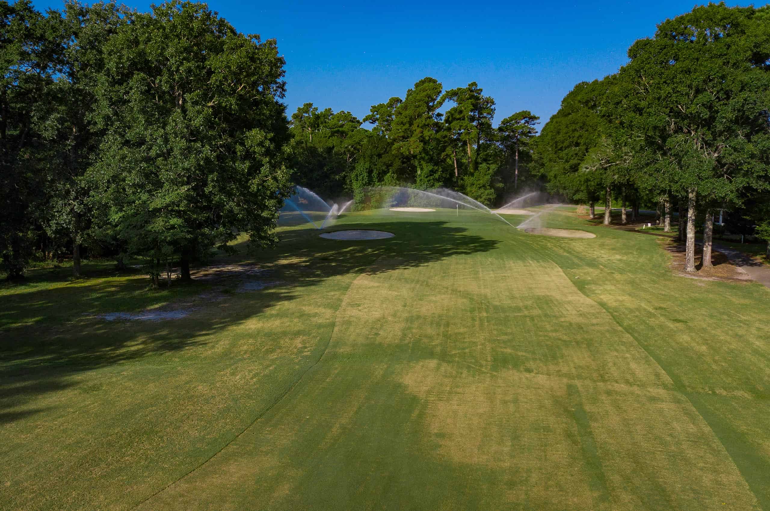 golf-course-sprinkler Dan Maples Golf Course -Sea Trail Plantation